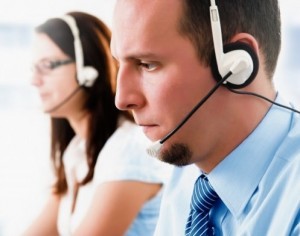 male and female agents on call with customers